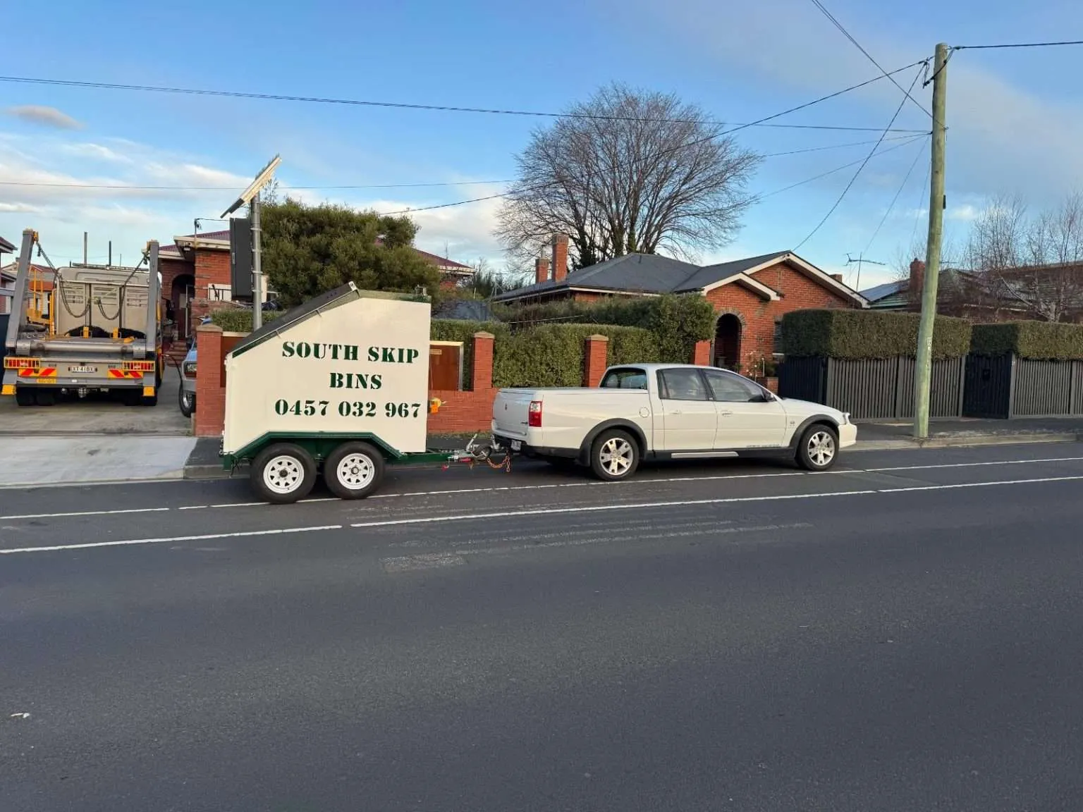 Trailer bin delivered to a Hobart street